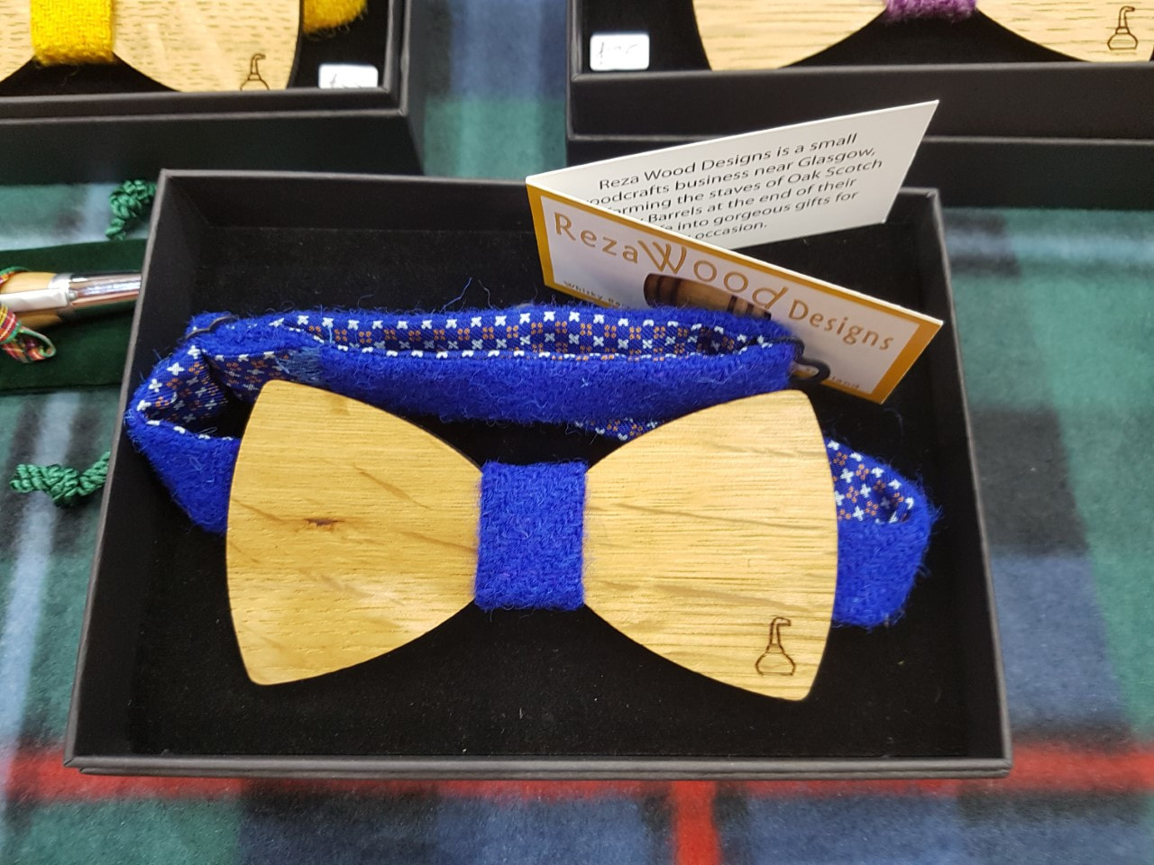 Whisky barrel wooden bowtie with blue Harris Tweed straps